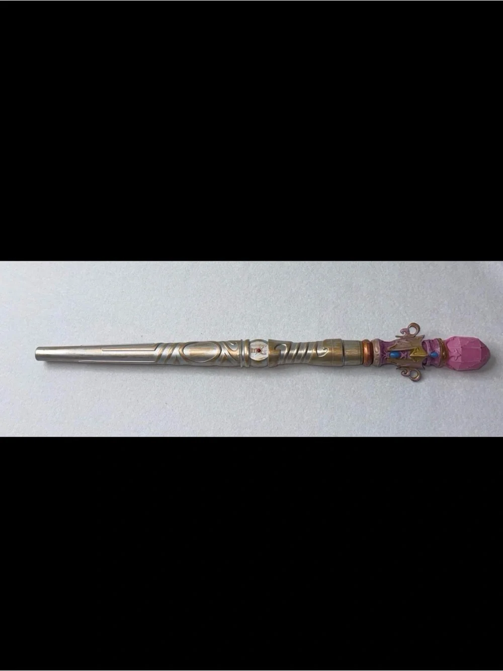 Ornate Decorative Wand with Pink Gem Accent